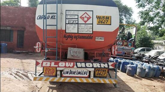 Police have booked two persons for the illegal sale of fuel in Sangrur on Saturday night. More than 18,000 litres of petrol and ethanol and three oil tankers have been seized, said the police.