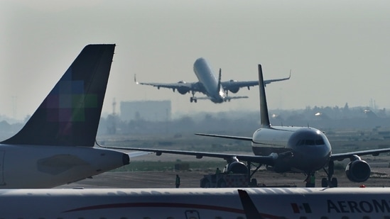 (Representational) Passenger planes take off from Benito Juárez International Airport in Mexico City, Thursday, May 12, 2022. (AP Photo/Marco Ugarte)(AP)