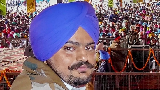 In this file photo dated Dec. 10, 2021 file photo, Congress leader and famous Punjabi singer Sidhu Moosewala, who was shot dead after unidentified persons opened fire at him in Punjab's Mansa district on Sunday, May 29, 2022. The incident took place a day after the Punjab government withdrew his security cover. (PTI Photo)