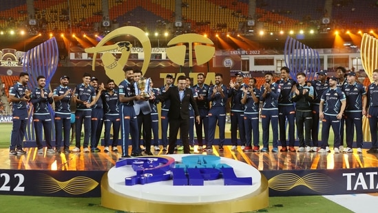 BCCI President Saurav Ganguly and BCCI Secretary Jay Shah hand over Gujarat Titans players the IPL trophy after winning the final (PTI)