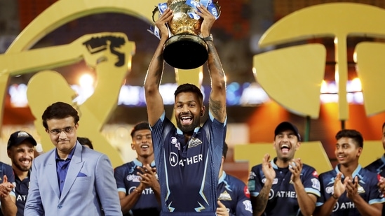 BCCI President Saurav Ganguly with Gujarat Titans players after winning the final T20 cricket match of the Indian Premier League 2022(PTI)