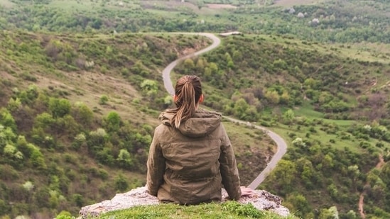 Sipping water from time to time, eating light and doing some breathing exercises can help you deal with digestive trouble while travelling(Unsplash)