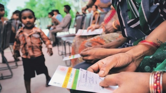 How to link an Aadhaar card with a PAN card without paying any fees - Quora