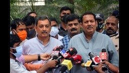 Sambhajiraje Chhatrapati (L) and Udayanraje Bhosale interact with the media after a discussion about the Maratha reservation in Pune. (HT FILE PHOTO)