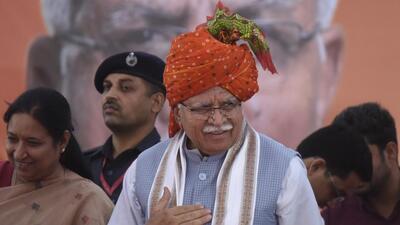 Haryana chief minister Manohar Lal Khattar with state BJP president OP Dhankhar (right) during an event at Rajiv Chowk, in Gurugram on Sunday. (Parveen Kumar/HT PHOTO)