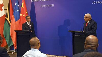 China’s foreign minister Wang Yi (left) and Fiji’s Prime Minister Frank Bainimarama address a press conference at the Pacific Islands Foreign Ministers’ meeting in Suva, Fiji, on Monday. (AP) China’s foreign minister Wang Yi (left) and Fiji’s Prime Minister Frank Bainimarama address a press conference at the Pacific Islands Foreign Ministers’ meeting in Suva, Fiji, on Monday. (AP)