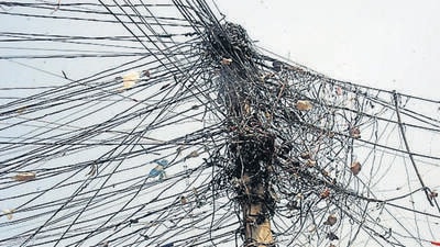 A fine of ₹25.67 lakh was imposed on 11 people for electricity theft and other violations in Zirakpur. (HT File Photo) A fine of ₹25.67 lakh was imposed on 11 people for electricity theft and other violations in Zirakpur. (HT File Photo)
