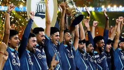 Gujarat Titans squad celebrates with the IPL trophy after winning IPL 2022 against Rajasthan Royals (ANI) Gujarat Titans squad celebrates with the IPL trophy after winning IPL 2022 against Rajasthan Royals (ANI)