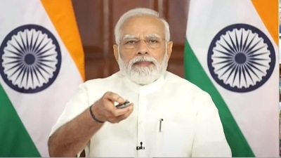 Prime Minister Narendra Modi releases benefits under the PM CARES for Children Scheme, through a video conference.&nbsp; (PTI)