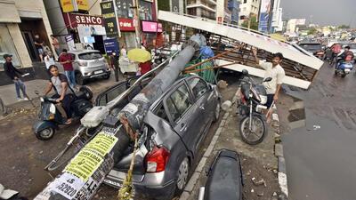 A view of damaged vehicles at South Extension on Monday. (Sanjeev Verma/HT) A view of damaged vehicles at South Extension on Monday. (Sanjeev Verma/HT)