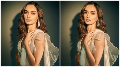 Over the weekend, Mansuhi took to Instagram to drop pictures of herself dressed in a stunning ivory look that mixed modern elements with traditional silhouettes. The beauty queen posted the photos with white heart emojis. She wore an ivory saree with an embellished blouse and matching belt. (Instagram) Over the weekend, Mansuhi took to Instagram to drop pictures of herself dressed in a stunning ivory look that mixed modern elements with traditional silhouettes. The beauty queen posted the photos with white heart emojis. She wore an ivory saree with an embellished blouse and matching belt. (Instagram)