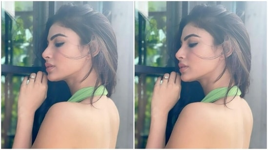 Mouni’s pastel green gown featured backless details and a halter neck. Mouni posed by the window and let the wind play with her hair.(Instagram/@imouniroy)