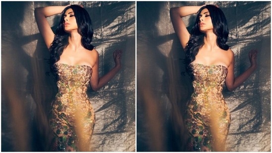 Mouni’s snippets from her fashion diaries are a treat for sore eyes. A few days back, Mouni gave us major party fashion goals in a sequined off-shoulder bodycon gown featuring intricate embroidery details in multicolour resham threads.(Instagram/@imouniroy)