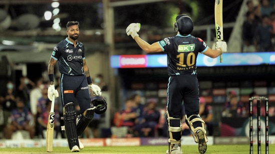 David Miller and Hardik Pandya of Gujarat Titans celebrate after winning a match in IPL 2022(IPL)