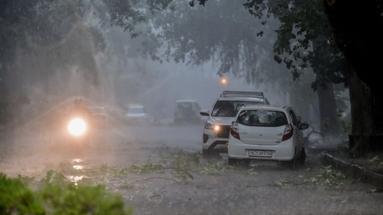 Lightning strikes and a short, intense spell of rain accompanied the gusty winds. According to the India Meteorological Department (IMD), this is the first storm of "severe" intensity in Delhi since 2018.(Photo by Raj K Raj/ Hindustan Times)
