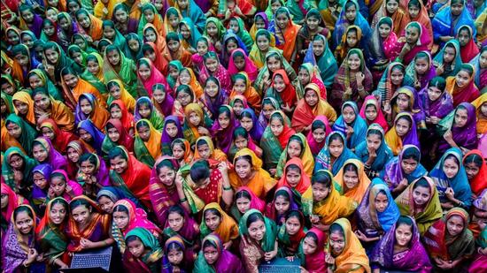 Pune, India - January 2, 2020: On 189th Birth Anniversary of Savitribai Phule(3rd Jan) and on 1st of Jan 1847 Mahatma Jotiba Phule and Savitribai Phule started the first girls school at Bhide wada, to celebrate the occasion 189 students of Ahilyadevi high school dressed like Savitribai and presented the modern version by using laptops, mobiles and various modern gadgets in Pune, India, on Thursday, January 2, 2020. (Photo by Sanket Wankhade/HT PHOTO)