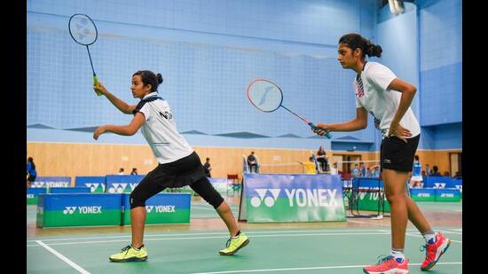 Pune, India - April 20, 2018: Tanisha(Pink Shoes) and Nida of UAE get ready to play at World school badminton championship held at Balewadi sports complex in Pune, India, on Friday, April 20, 2018. (Photo by Sanket Wankhade/HT PHOTO)