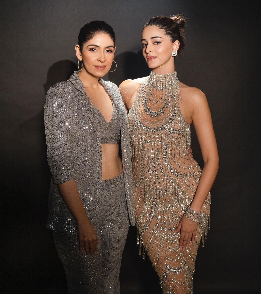 Ananya Panday posed with mother Bhavana Panday before attending Karan Johar's birthday bash in Mumbai. Ananya Panday posed with mother Bhavana Panday before attending Karan Johar's birthday bash in Mumbai.