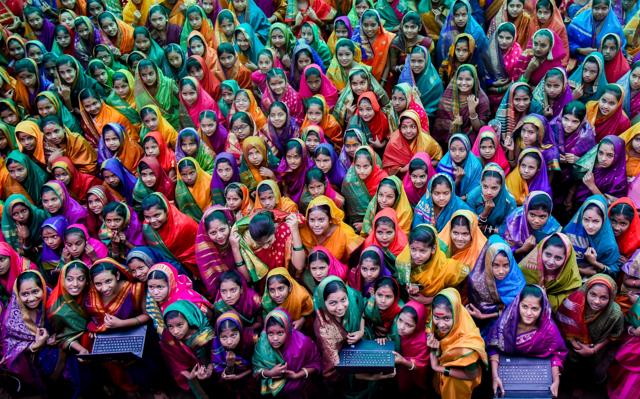Pune, India - January 2, 2020: On 189th Birth Anniversary of Savitribai Phule(3rd Jan) and on 1st of Jan 1847 Mahatma Jotiba Phule and Savitribai Phule started the first girls school at Bhide wada, to celebrate the occasion 189 students of Ahilyadevi high school dressed like Savitribai and presented the modern version by using laptops, mobiles and various modern gadgets in Pune, India, on Thursday, January 2, 2020. (Photo by Sanket Wankhade/HT PHOTO)