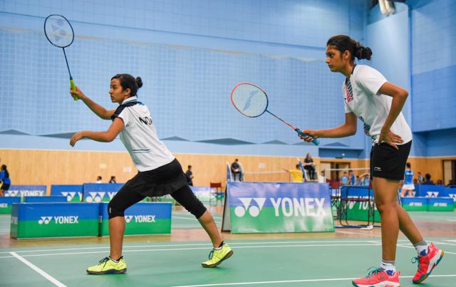 Pune, India - April 20, 2018: Tanisha(Pink Shoes) and Nida of UAE get ready to play at World school badminton championship held at Balewadi sports complex in Pune, India, on Friday, April 20, 2018. (Photo by Sanket Wankhade/HT PHOTO)