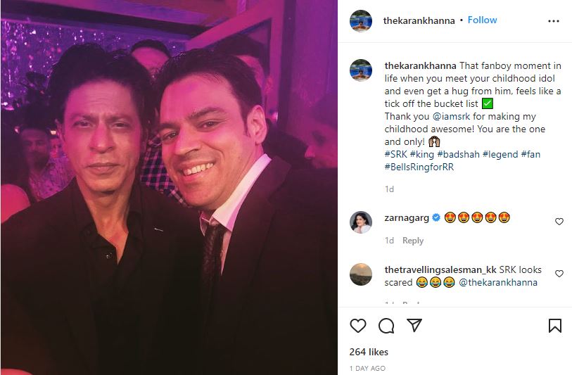Shah Rukh with a fan.
