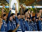 Gujarat Titans squad celebrates with the IPL trophy(ANI) Gujarat Titans squad celebrates with the IPL trophy(ANI)
