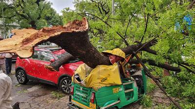 Damaged vehicles after thunderstorm in New Delhi on Monday. (PTI) Damaged vehicles after thunderstorm in New Delhi on Monday. (PTI)