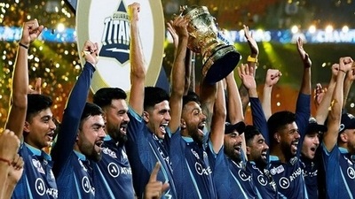 Gujarat Titans squad celebrates with the IPL trophy (ANI)
