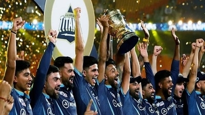 Gujarat Titans squad celebrates with the IPL trophy (ANI) Gujarat Titans squad celebrates with the IPL trophy (ANI)