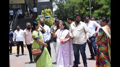 Women celebrate after the lottery reservation at Pimpri Chinchwad Municipal Corporation on Tuesday. (HT PHOTO)