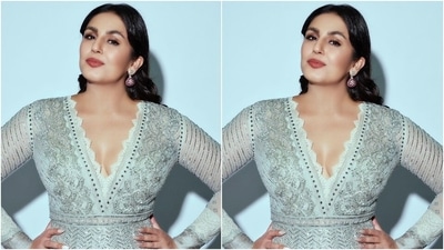 Huma's anarkali comes in a greyish-toned ivory shade adorned with silver and golden embroidery. The ensemble features a plunging V neckline with scalloped borders, long sleeves with sheer panels, scalloped ankle-grazing hem length, fit and flared silhouette, geometrically-placed diamantes, and detailed thread embroidery. (Instagram) Huma's anarkali comes in a greyish-toned ivory shade adorned with silver and golden embroidery. The ensemble features a plunging V neckline with scalloped borders, long sleeves with sheer panels, scalloped ankle-grazing hem length, fit and flared silhouette, geometrically-placed diamantes, and detailed thread embroidery. (Instagram)