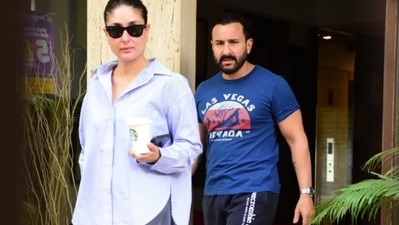 Kareena Kapoor and Saif Ali Khan snapped outside their residence in Mumbai. Kareena Kapoor and Saif Ali Khan snapped outside their residence in Mumbai.