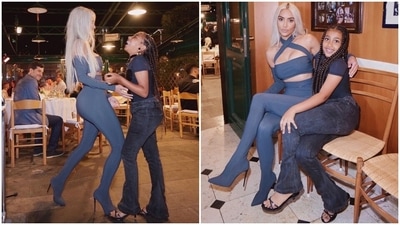 While the Keeping Up with the Kardashians star wore an ash blue two-piece ensemble consisting of pantaboots and a crop top with criss-cross detailing, North wore a fitted navy top and black acid-washed flared jeans. What do you think of their glam looks? (Instagram) While the Keeping Up with the Kardashians star wore an ash blue two-piece ensemble consisting of pantaboots and a crop top with criss-cross detailing, North wore a fitted navy top and black acid-washed flared jeans. What do you think of their glam looks? (Instagram)