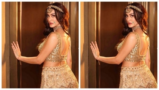 Amyra played muse to fashion designer house Label Arshi Singhal and picked a golden lehenga for the pictures.(Instagram/@amyradastur93)