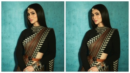 In an oxidised neck choker, a bracelet, a maangtikka and a ring from the house of Abhilasha Pret Jewellery, she further accessorised her ethnic look.(Instagram/@imouniroy)