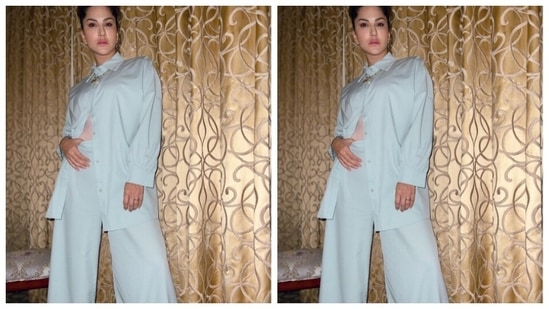 Sunny teamed a pastel pink top with a white oversized shirt and a pair of white trousers with wide legs.(Instagram/@sunnyleone)