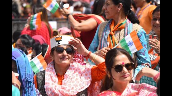 BJP supporters attend Prime Minister Narendra Modi's rally in Shimla on Tuesday.  (Deepak Sanstha/HT)