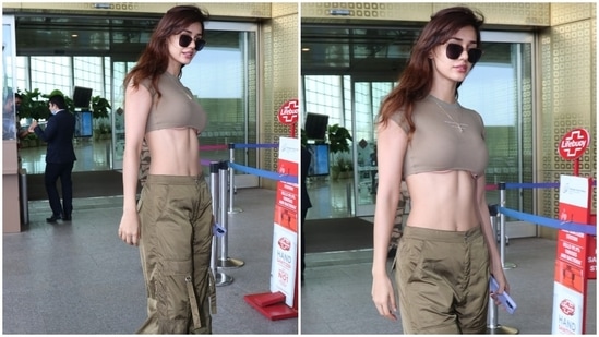 Disha paired the cropped top with olive green baggy cargo pants. The trousers feature a low-rise waistline, several pockets on the front, cinched hem, and a button-up detail on the waist.(HT Photo/Varinder Chawla)