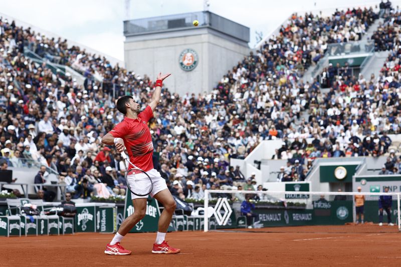 Serbia's Novak Djokovic in action during his fourth round match against Argentina's Diego Sebastian Schwartzman (REUTERS)