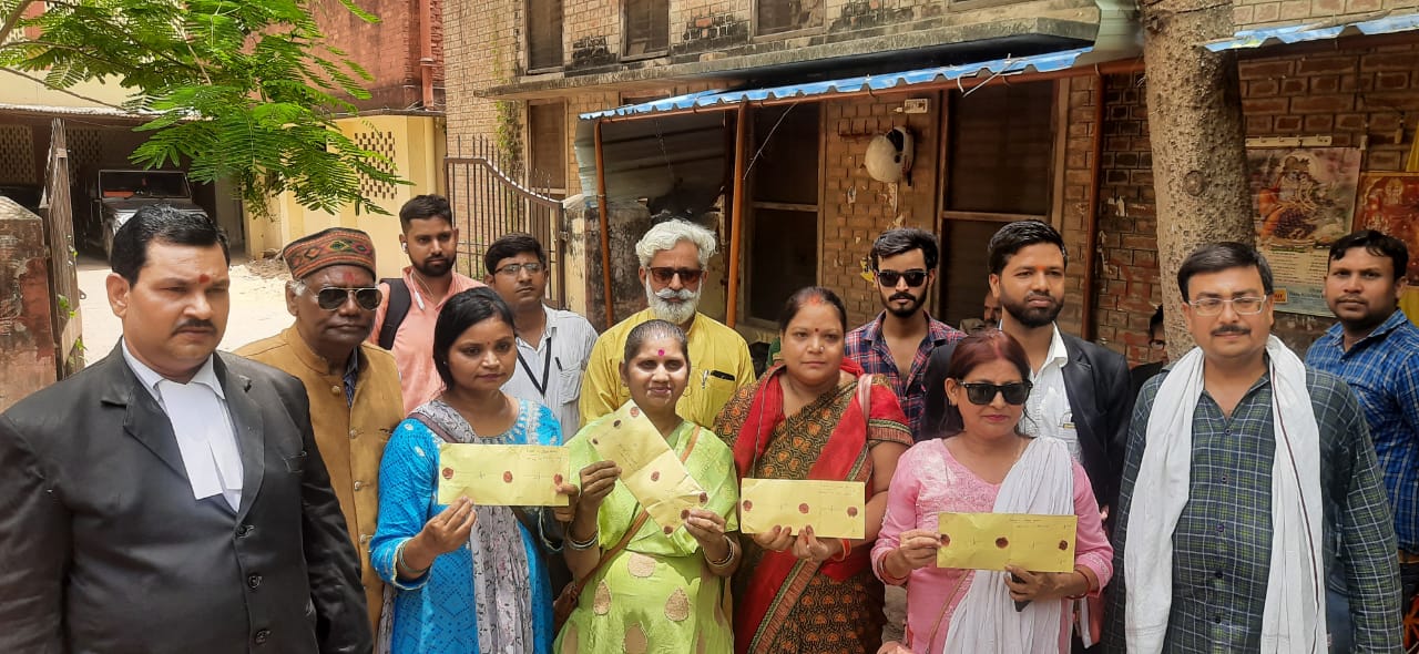 Women showing sealed envelop carrying footage and photographs of survey carried out inside the Gyanvapi mosque.&nbsp; (HT Photo)