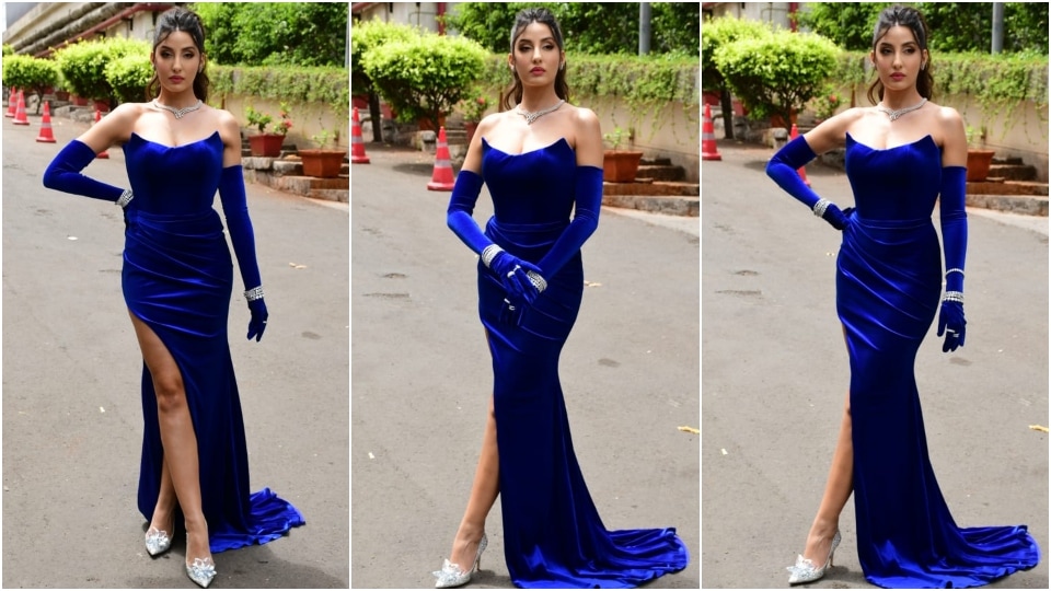 Nora Fatehi chose striking accessories to style the gown.&nbsp;(HT Photo/Varinder Chawla)