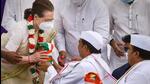 Interim Congress president Sonia Gandhi accepts sand and water from various states from 'padayatris' at the concluding ceremony of the party's Azadi Gaurav Yatra, at Rajghat in New Delhi on Wednesday. (PTI Photo) Interim Congress president Sonia Gandhi accepts sand and water from various states from 'padayatris' at the concluding ceremony of the party's Azadi Gaurav Yatra, at Rajghat in New Delhi on Wednesday. (PTI Photo)