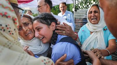 Relatives and daughter of slain schoolteacher Rajni Bala mourn in Samba on Tuesday. (PTI)