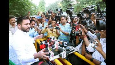 RJD leader Tejashwi Yadav interacts with the media outside Rabri Devi's residence in Patna on Wednesday. (Santosh Kumar/HT Photo) RJD leader Tejashwi Yadav interacts with the media outside Rabri Devi's residence in Patna on Wednesday. (Santosh Kumar/HT Photo)