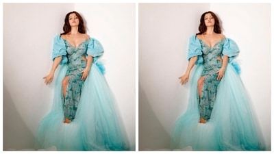 Rubina’s bodycon gown featured midriff-baring details, embellishments in green and silver resham threads and dramatic puffed sleeves. (Instagram/@rubinadilaik)