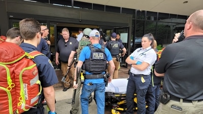 Emergency personnel work at the scene of a shooting at the Warren Clinic in Tulsa, Oklahoma. (via Reuters)