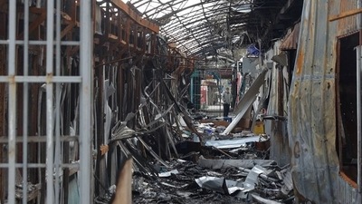 A local resident stands next to debris of an open market destroyed by a military strike, as Russia's attack on Ukraine continues, in Sievierodonetsk, Luhansk region. (File image) (REUTERS)