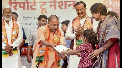UP chief minister Yogi Adityanath during a press conference organised to commemorate the completion of 8 years of Prime Minister Narendra Modi’s BJP-led government at the centre, in Lucknow, Wednesday. Deputy CM Keshav Prasad Maurya and UP BJP president Swatantra Dev Singh are also seen (PTI Photo) UP chief minister Yogi Adityanath during a press conference organised to commemorate the completion of 8 years of Prime Minister Narendra Modi’s BJP-led government at the centre, in Lucknow, Wednesday. Deputy CM Keshav Prasad Maurya and UP BJP president Swatantra Dev Singh are also seen (PTI Photo)