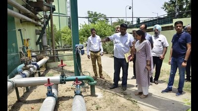 PEDA CEO Sonali Giri inspecting the 225 metric-tonne biogas plant at Haibowal dairy complex in Ludhiana on Wednesday. (Harvinder SIngh/HT)