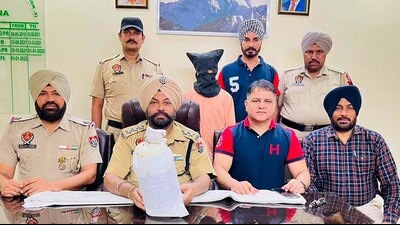 The accused in custody of Ludhiana police on Monday. (HT Photo) The accused in custody of Ludhiana police on Monday. (HT Photo)